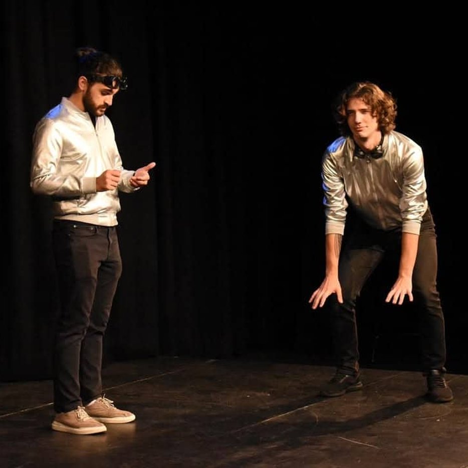 Performer delivering solo improv piece